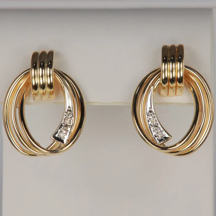 14K Yellow Gold Swirled Loop Earrings with Diamond Accents Moriartys Gem Art Earrings 14K Yellow Gold Swirled Loop Earrings with Diamond Accents Moriartys Gem Art Earrings