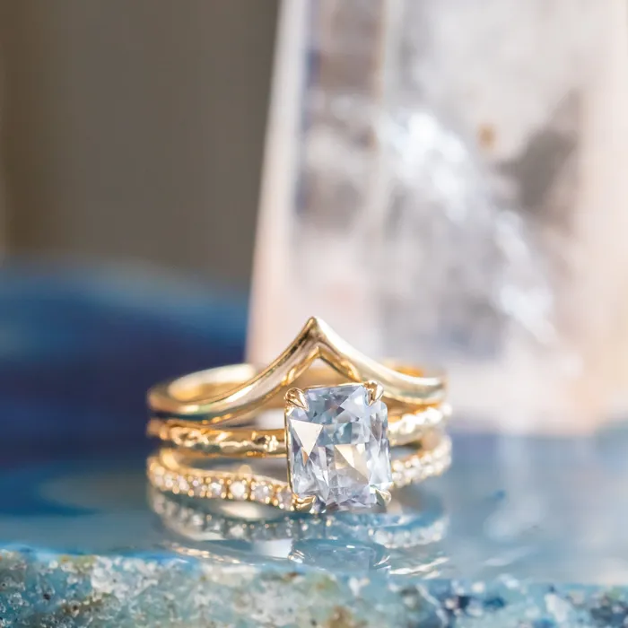305ct Radiant Cut Sapphire Evergreen Solitaire in 14k Yellow Gold Tucson Show Earrings
