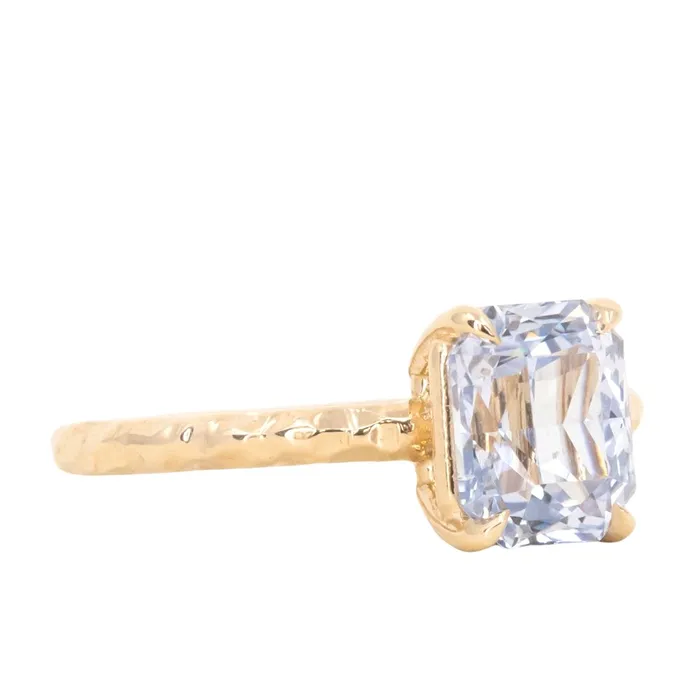 305ct Radiant Cut Sapphire Evergreen Solitaire in 14k Yellow Gold Tucson Show Earrings