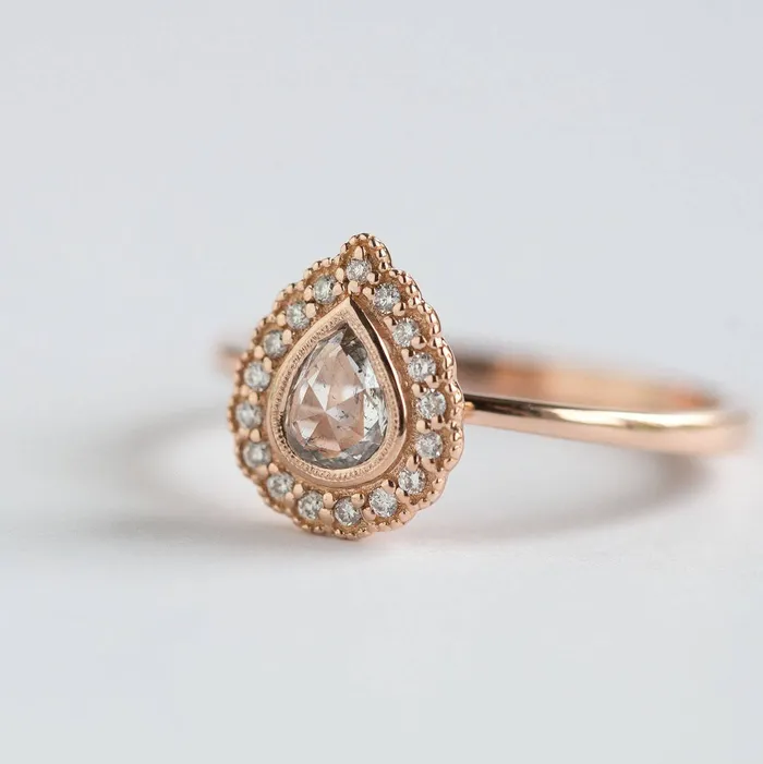 Anueva Jewelry Rings Rose Gold Pear Rosecut Diamond Antique Style Engagement Ring Milgrain detail scalloped diamond halo with bezel set pear by Anueva Jewelry Anueva Jewelry Rings Rose Gold Pear Rosecut Diamond Antique Style Engagement Ring Milgrain detail scalloped diamond halo with bezel set pear by Anueva Jewelry